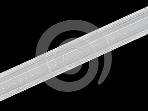 Aerial view of highway in city isolated on black background. Cars crossing interchange overpass. Highway interchange with trafficA