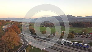 Aerial view of highway interstate road with fast moving traffic in europe.