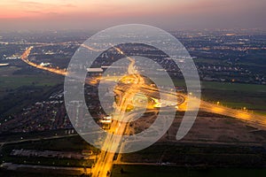 Aerial view of highway junctions. Bridge roads shape number 8 or infinity sign in structure of architecture concept. Top view. photo