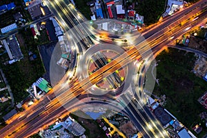 Aerial view of highway junctions Top view of Urban city, Bangkok at night, Thailand