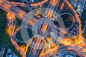 Aerial view of highway junctions Top view of Urban city, Bangkok at night, Thailand photo