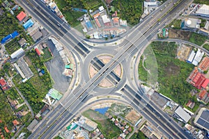 Aerial view of highway junctions Top view of Urban city, Bangkok at day, Thailand