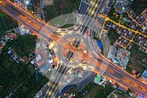 Aerial view of highway junctions Top view of Urban city, Bangkok at night, Thailand