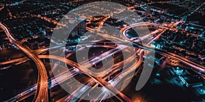 Aerial view of highway and overpass with cars in city. AI generative illustration