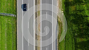 Aerial view of highway in Poland. Cars are moving on a highway road.