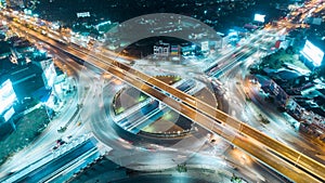 Aerial view highway road intersection at dusk for transportation, distribution or traffic background