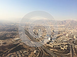 Aerial View of highway and Tehran city from above Milad Tower, Tehran, Iran
