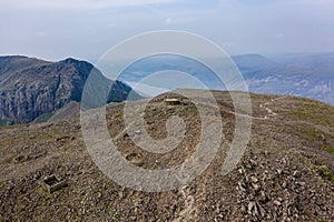 Aerial view of hikers on the summit of Scafell Pike - England`s tallest mountain