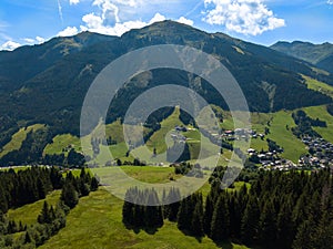 Aerial view from Hinterglemm to Saalbach on a summer day in the Alps at Saalbach-Hinterglemm, Austria