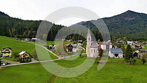 Aerial view of historic church in scenic Gosau village in Austria