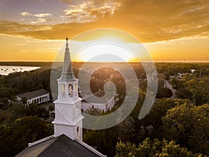 Aerial view of historic church steeple and sunset in Beaufort, S photo