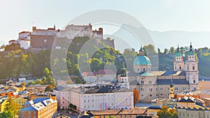 Aerial view of the historic city of Salzburg with Festung Hohensalzburg Fortress and Salzburger Cathedral Dom. Old town scenery