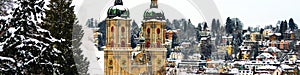 Aerial view of historical buildings covered in snow in winter. Cathedral in St Gallen, Switzerland