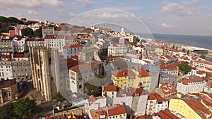 Aerial view of historical part of Lisbon and Lisbon Cathedral at sunny day Portugal