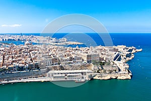 Aerial view of historical Valetta, capital city of Malta, Grand harbour, Sliema town, Marsamxett bay from above.