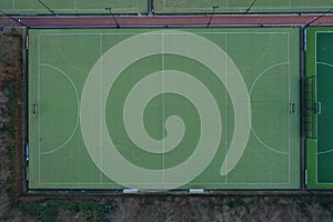 Aerial view of a hockey field with artificial green colored grass