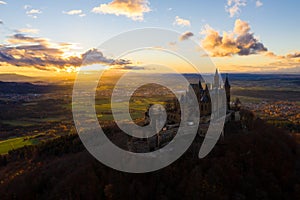 Aerial view of Hohenzollern castle during bright sunset. Germany in the fall