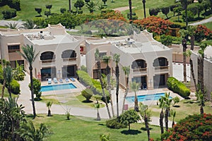 Aerial view of holiday villas in luxury hotel resort