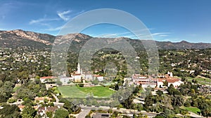 Aerial view of homes in Santa Barbara, California. The historic Santa Barbara Spanish Mission in California. Cinematic