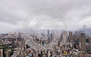 Aerial view of Hong Kong apartments in cityscape background. Res