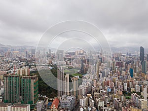 Aerial view of Hong Kong apartments in cityscape background. Res