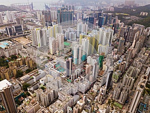 Aerial view of Hong Kong apartments in cityscape background. Res