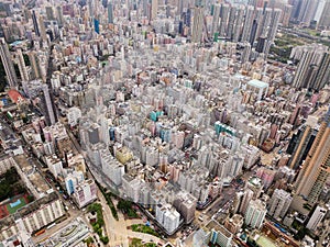 Aerial view of Hong Kong apartments in cityscape background. Res