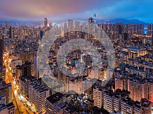 Aerial view of Hong Kong apartments in cityscape background. Res