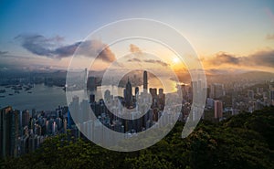 Aerial view of Hong Kong Central district and Victoria Harbour at sunrise, China