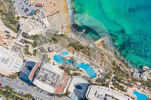 Aerial view of the hotel building swimming pools, sandy beach, resort coast on the Mediterranean coast