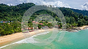 Aerial view of hotels and resorts next to the tropical Nangthong Beach in Khao Lak, Thailand