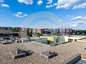 Aerial view of house flat roof on residental building. Modern architecture exterior. Air conditioning systems and ventilation