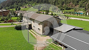 Aerial view of houses and mountains in the countryside of Val Brembana, Italy