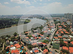 Aerial view of houses and Song Sai Gon river in District 2 of Ho Chi Minh City