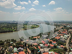 Aerial view of houses and Song Sai Gon river in District 2 of Ho Chi Minh City