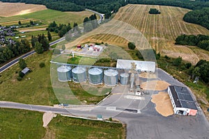 aerial view of huge agro-industrial complex with silos and grain drying line