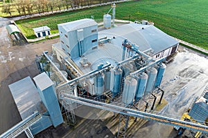 aerial view of huge agro-industrial complex with silos and grain drying line