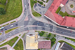 Aerial view of huge road junction of freeway with heavy traffic at city