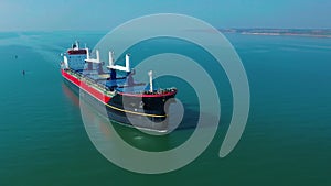 Aerial view of huge ship floating in the sea