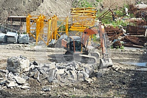 Aerial view Hydraulic scissors on rigging to cut abandoned buildings destroy building, Hydraulic scissors on rig of