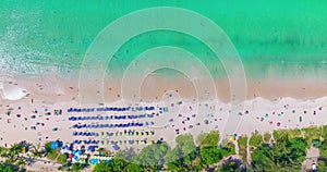 Aerial View Hyperlapse,Amazing beach with travel people relaxation on the beach,Beautiful sea in summer season at Phuket island Th