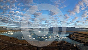 Aerial view of icebergs floating out to sea at Jokusarlon Glacial Lagoon, Southeast Iceland