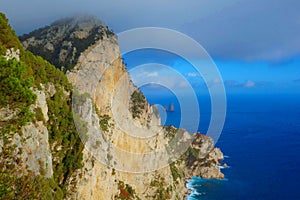 Aerial view at the iconic cliffs of Capri island in Campania, Naples, Italy