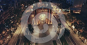 Aerial view of iconic landmark of Barcelona - Triumphal Arch (Arco de Triunfo) on central avenue at twilight