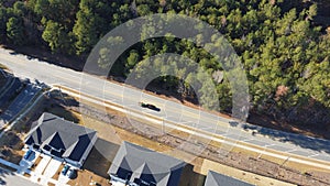 Aerial view of identical houses on a curved street in a residential area, Garner, North Carolina