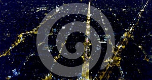 Aerial view of illuminated Eixample district in Barcelona at night, Spain