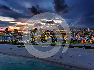Aerial view of illuminated Ocean Drive and South beach, Miami, Florida, USA