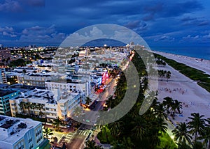 Aerial view of illuminated Ocean Drive and South beach, Miami, Florida, USA