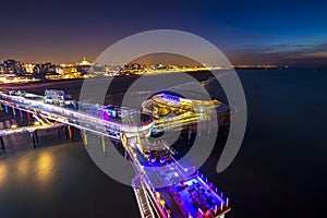 Aerial view on the illuminated pier at Scheveningen, the Hague at night