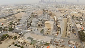 Aerial view industrial area with factories, warehouses, hangars in the outskirts of Dubai